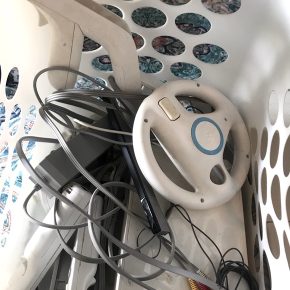 Wii with 6 games and accessories 1 country dance video and 5 work out videos